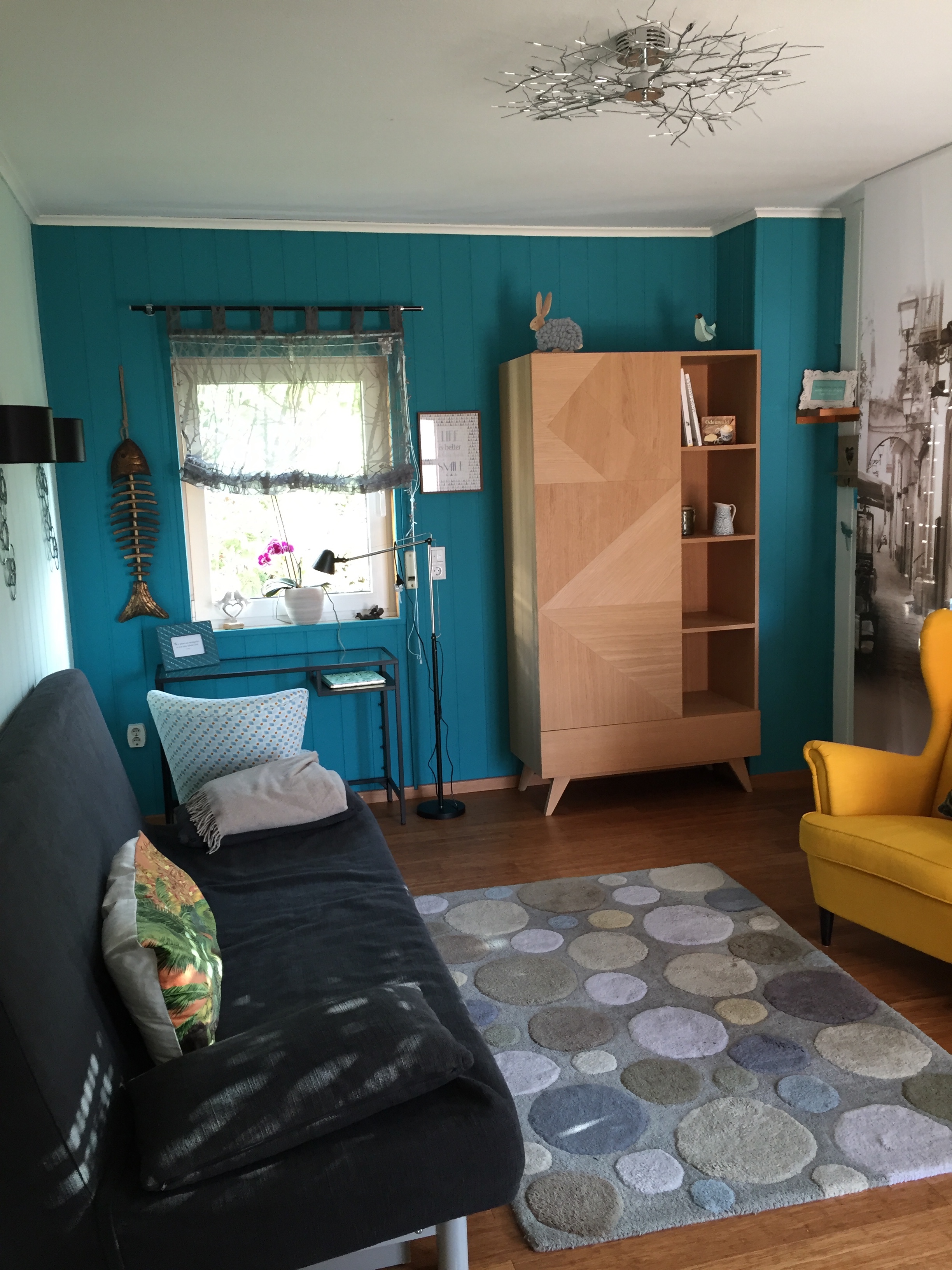 Bright living room at Maison-Nature with colourful decor